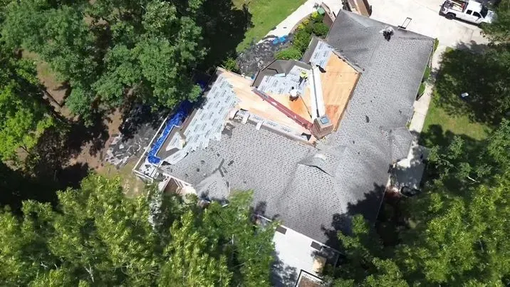 high aerial view from drone of roof replacement project