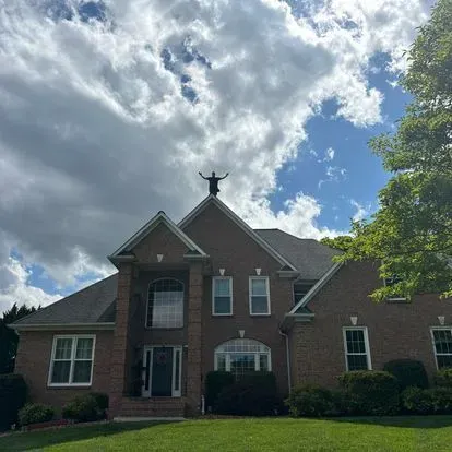 new roof installation on brick home